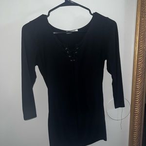 Small lace up black shirt, shapes body nicely